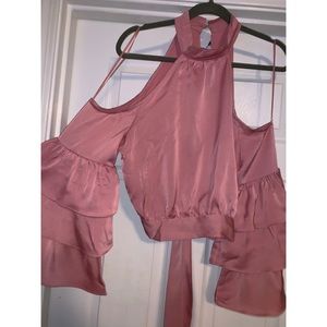 Open shoulder, ruffle sleeve pink blouse.